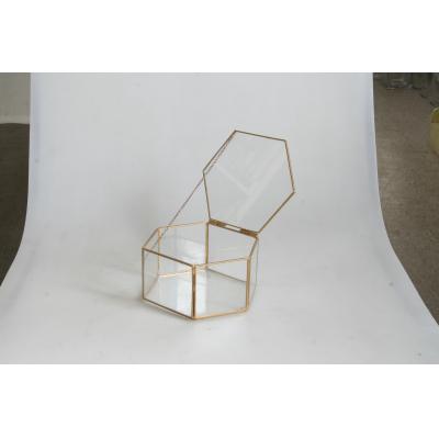 Gold hexagon box with string
